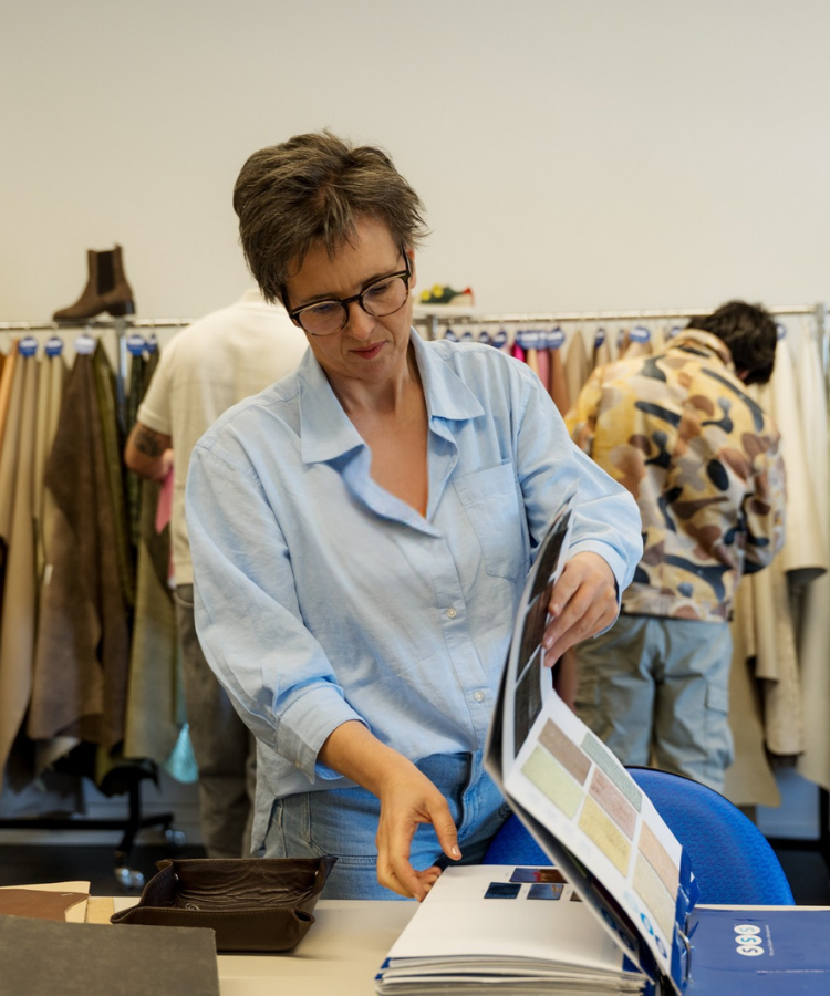 Sorting real leather swatches at a Portuguese materials supplier
